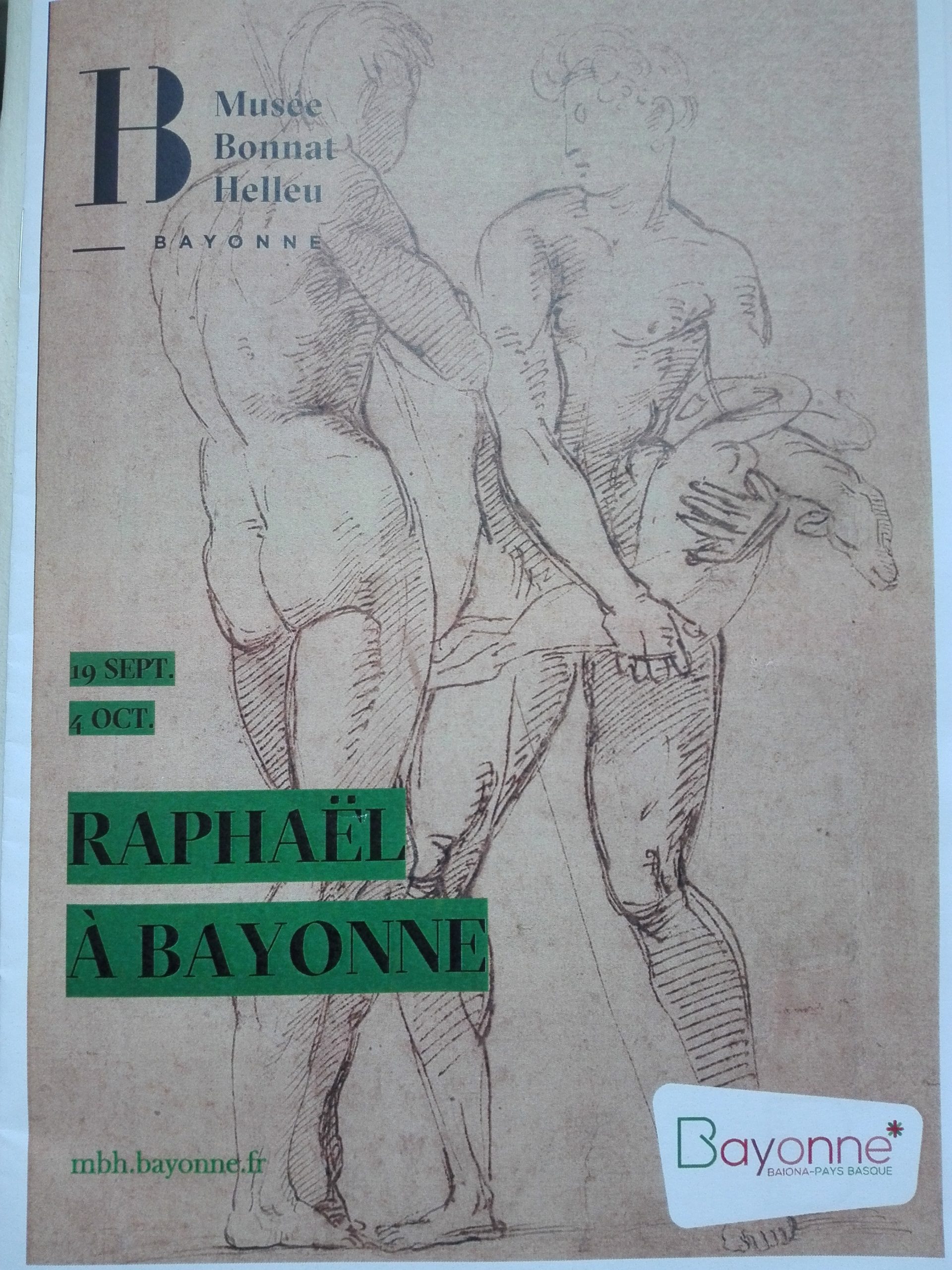 Affiche de l'exposition Raphaël, Deux hommes nus debout, celui de droite portant un agneau dans ses bras
